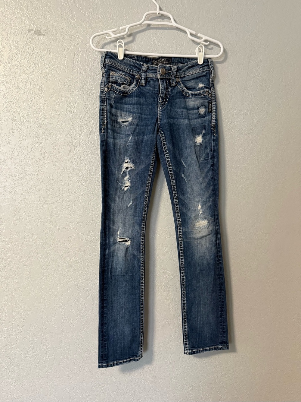 Silver Jeans dark blue distressed baby bootcut